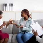 african-american-lesbian-couple-having-consultation-with-psychologist-at-office-pfuz9fnzkyb5ixsobyf7r42qir86omy899f7chql38